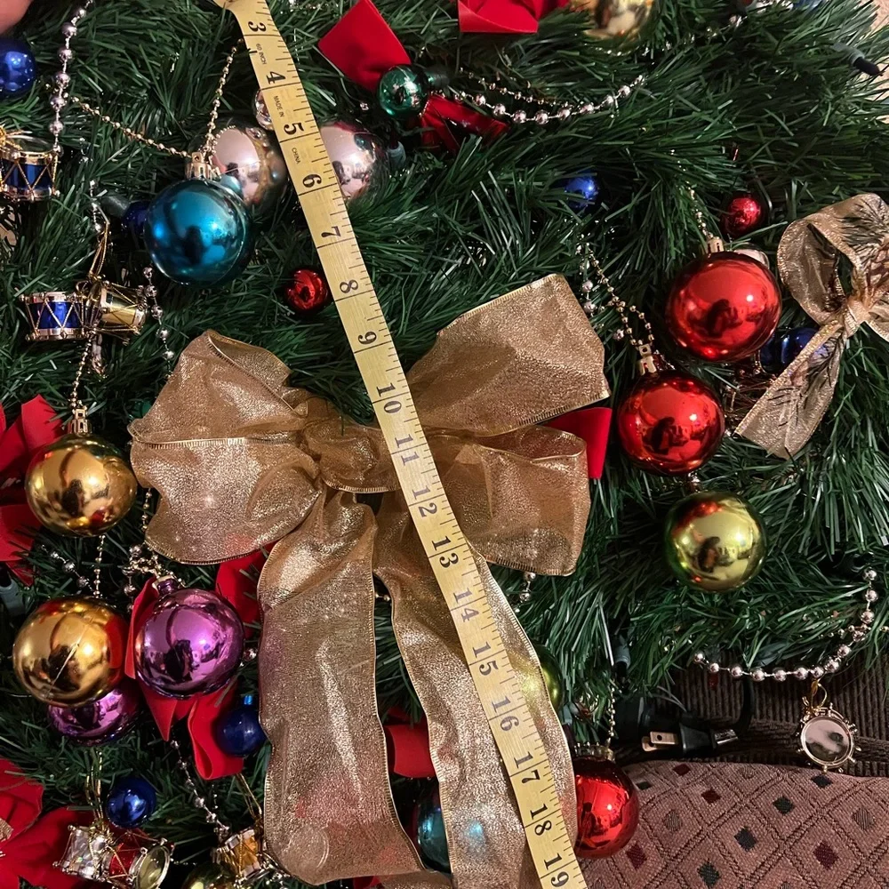 Festive Holiday Wreath with Gold Bow and Multicolor Ornaments